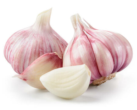 Garlic closeup isolated on white background. With clipping path. Garlic closeup isolated on white background. With clipping path.